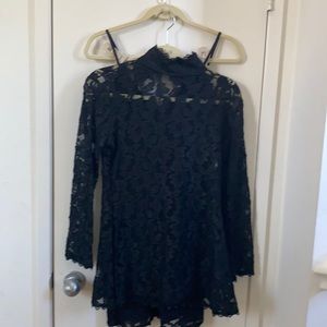 Women’s two piece dress and lace blouse.